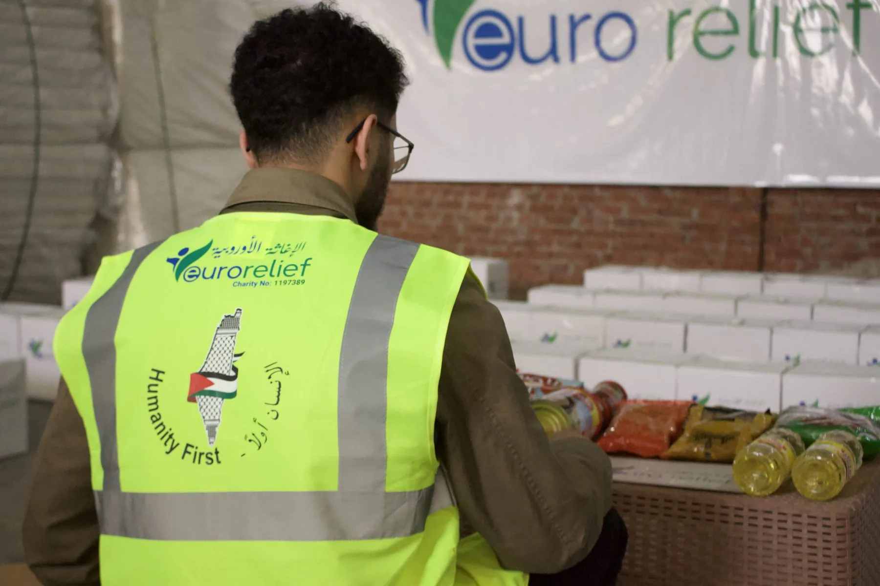 A volunteer at work in the aid warehouse